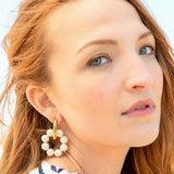 Kenneth Jay Lane Pearl Earrings Door Knocker on model with red hair in striped shirt