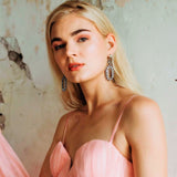 Rhiannon Earrings Crystal by Elizabeth Cole Jewelry on model in pink tulle dress with blonde hair
